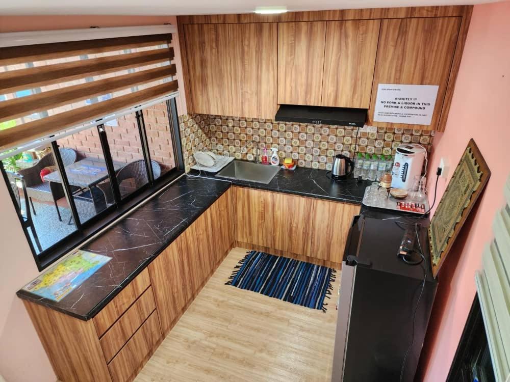 Umbai Kelana Homestay *